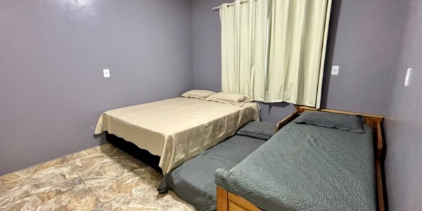 Segunda suíte climatizada ideal para acomodação de casais